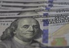 Dólar cai para R$ 5,21 em dia de correção no mercado