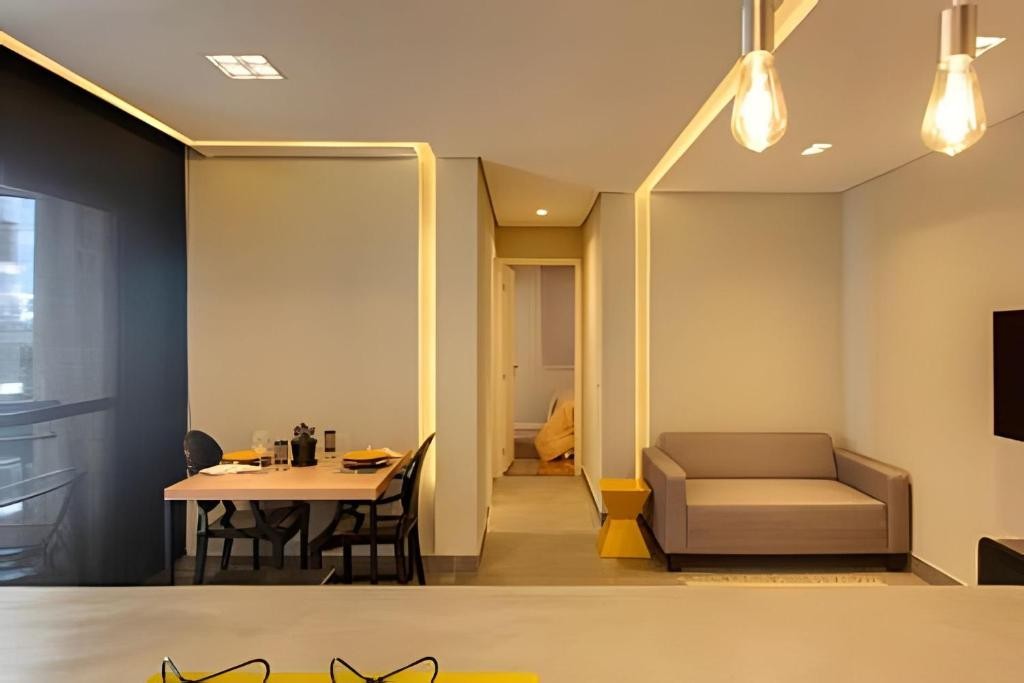 Apartamento moderno com cozinha integrada, varanda e acabamento sofisticado