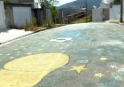 Moradores pintam rua em Poços de Caldas em homenagem a Mauro Ramos, capitão da Seleção em 1962